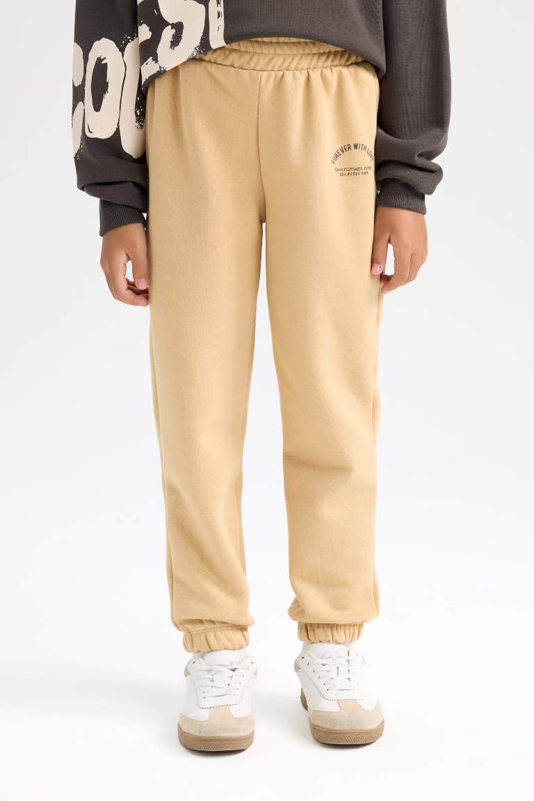 Pantalon de Jogging imprimé avec taille et bas élastiques Coupe standard pour fille