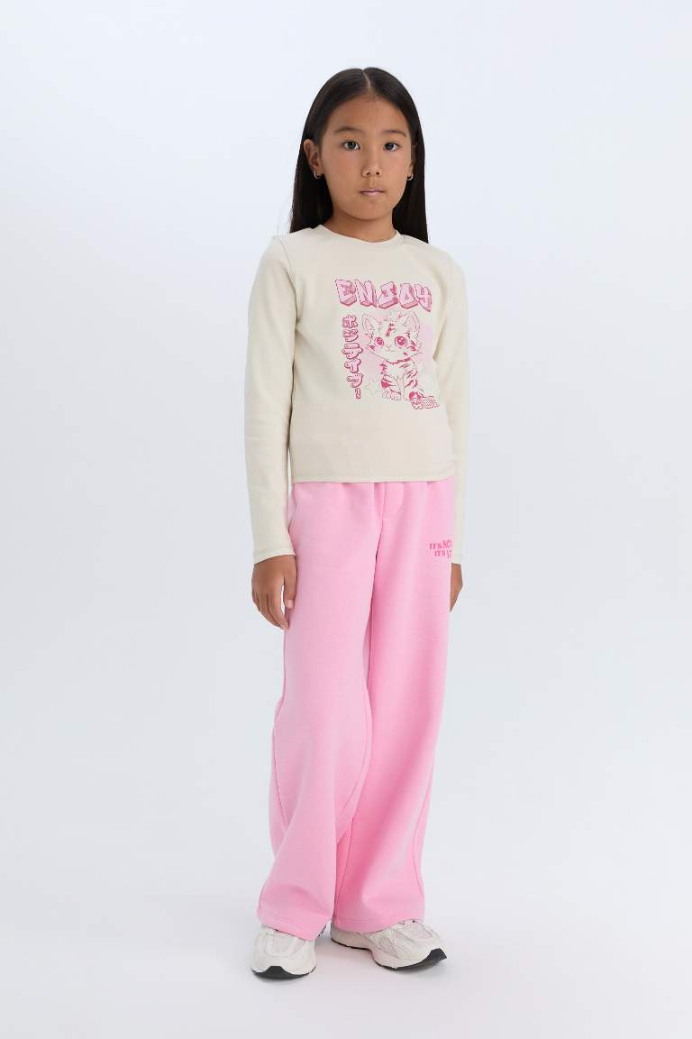 Pantalon de survêtement large avec taille élastique et à imprimé pour fille