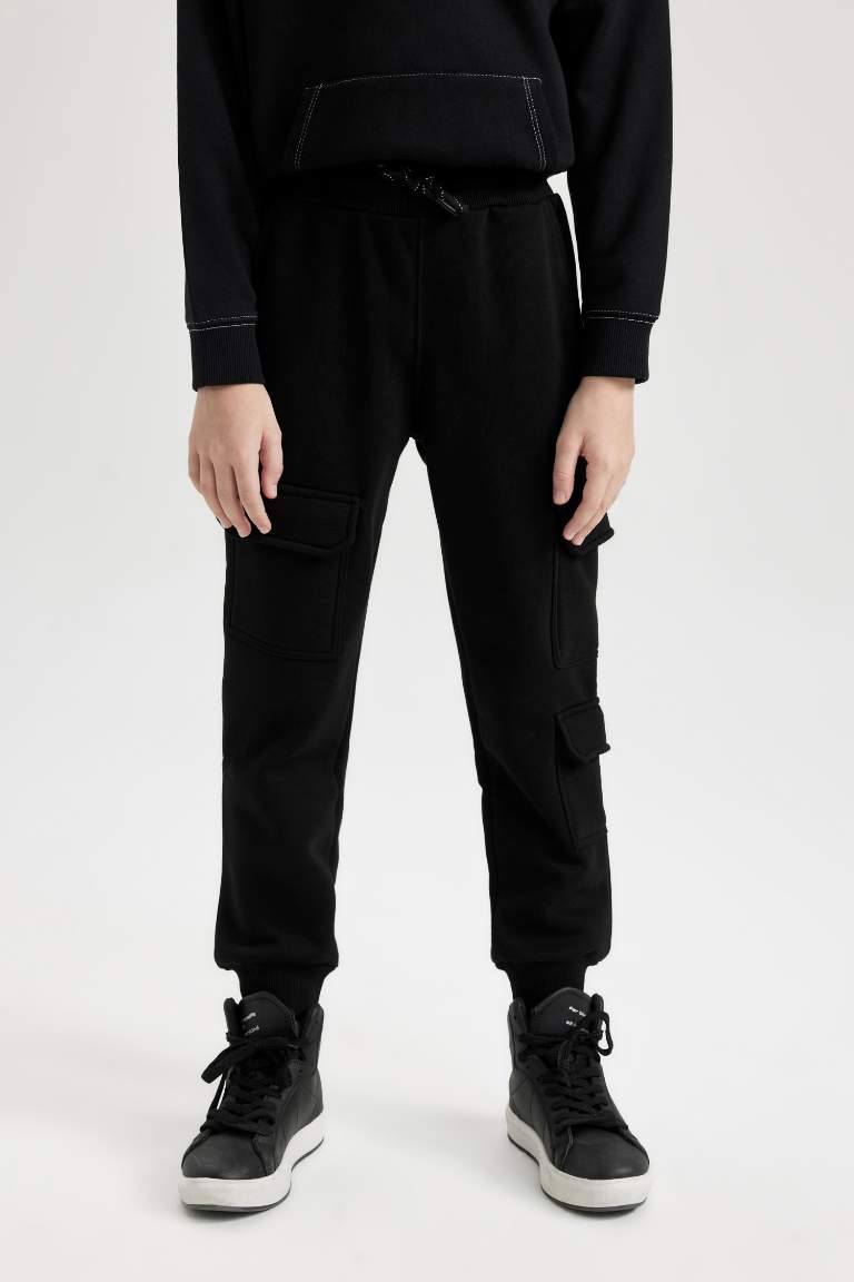 Pantalon Jogging noir à taille élastique et jambes larges pour Fille