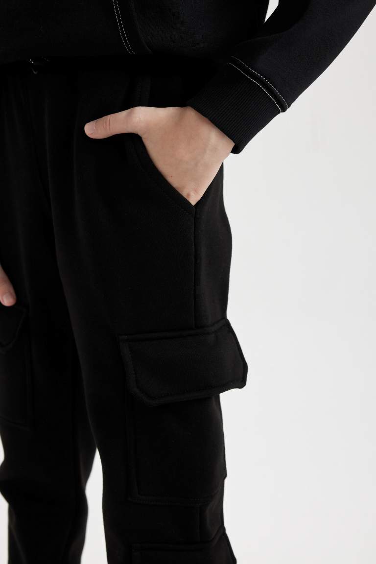 Pantalon Jogging noir à taille élastique et jambes larges pour Fille