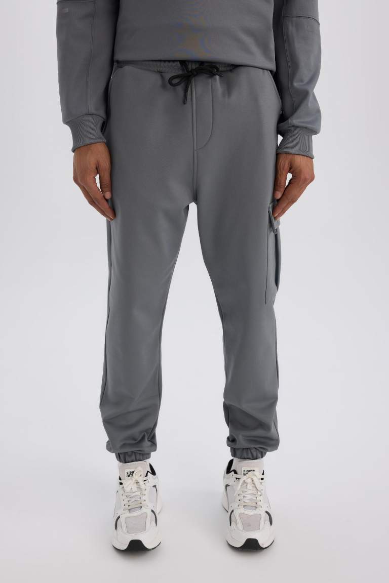 DeFactoFit Sporcu Jogger Eşofman Altı Standart Fit Üç Cepli Beli Bağcıklı Lastikli Paça
