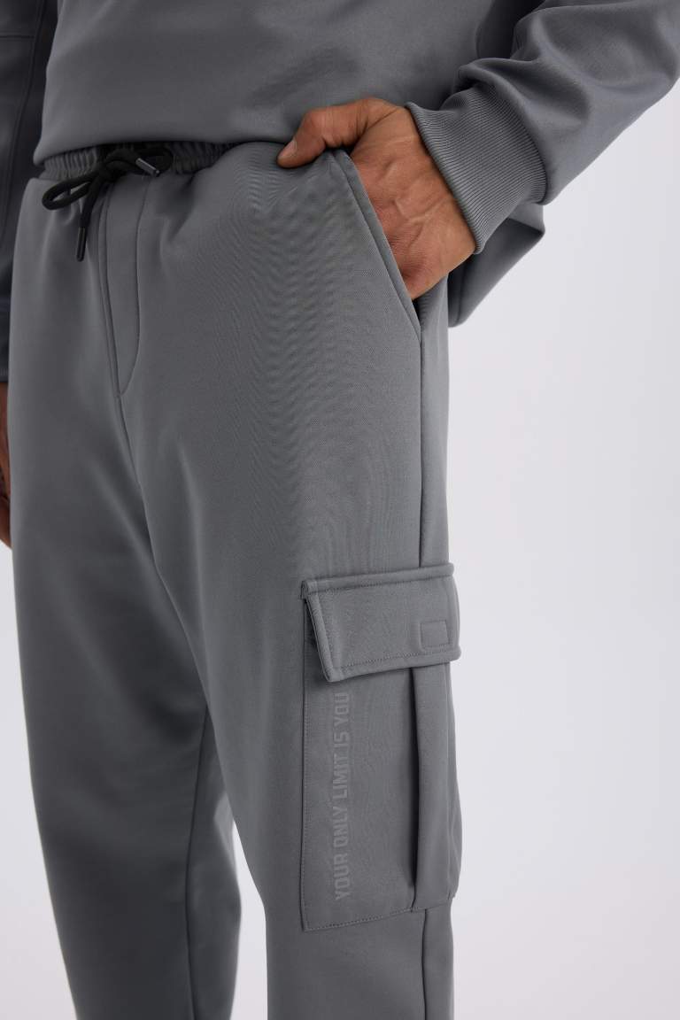 DeFactoFit Sporcu Jogger Eşofman Altı Standart Fit Üç Cepli Beli Bağcıklı Lastikli Paça