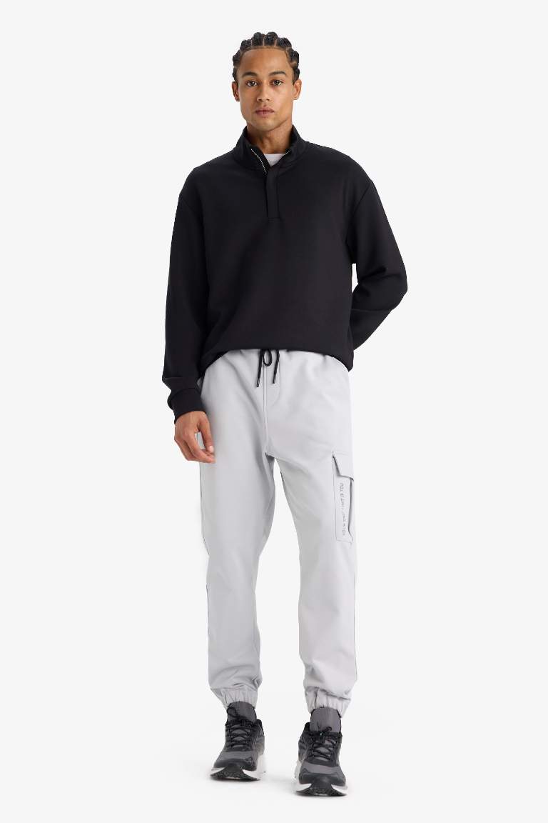 DeFactoFit Sporcu Jogger Eşofman Altı Standart Fit Üç Cepli Beli Bağcıklı Lastikli Paça