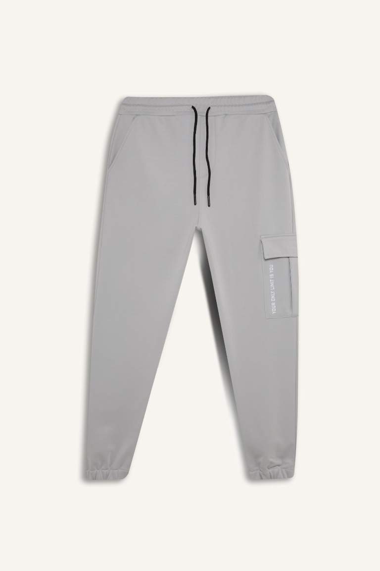 DeFactoFit Sporcu Jogger Eşofman Altı Standart Fit Üç Cepli Beli Bağcıklı Lastikli Paça