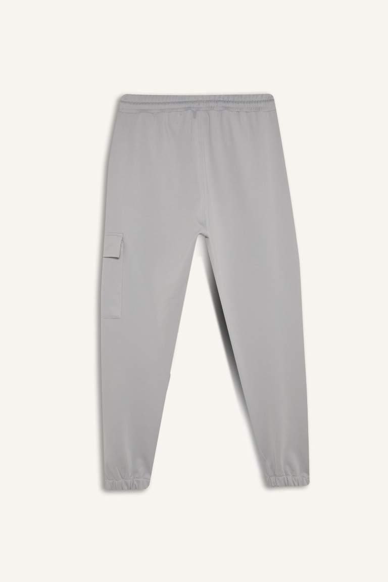 DeFactoFit Sporcu Jogger Eşofman Altı Standart Fit Üç Cepli Beli Bağcıklı Lastikli Paça