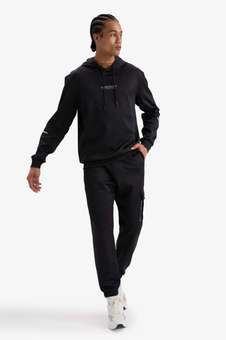 DeFactoFit Standart Fit Üç Cepli Sporcu Jogger Eşofman Altı