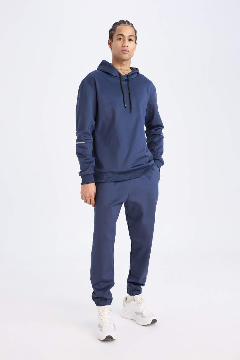 DeFactoFit Sporcu Jogger Eşofman Altı Standart Fit Basic Düz Cepli Beli Paçası Lastikli