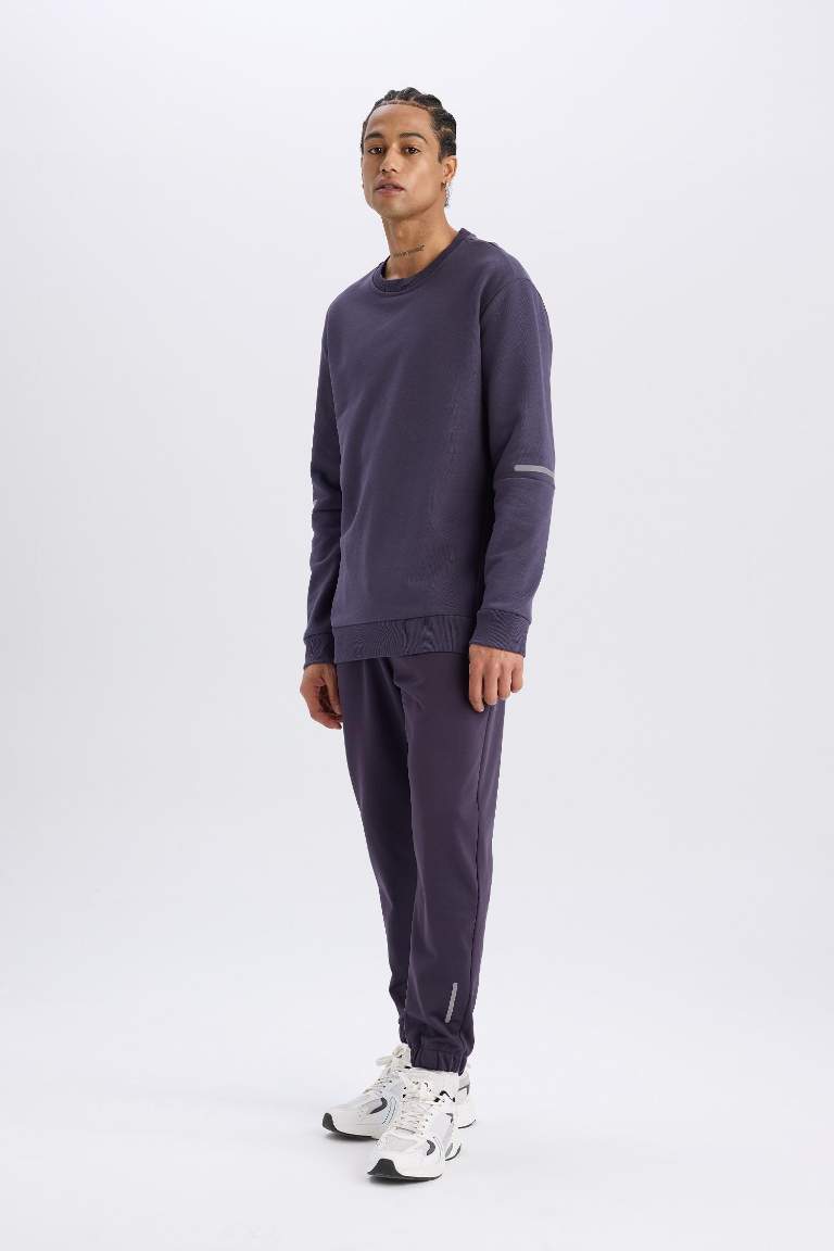 DeFactoFit Sporcu Jogger Eşofman Altı Standart Fit Basic Düz Cepli Beli Paçası Lastikli