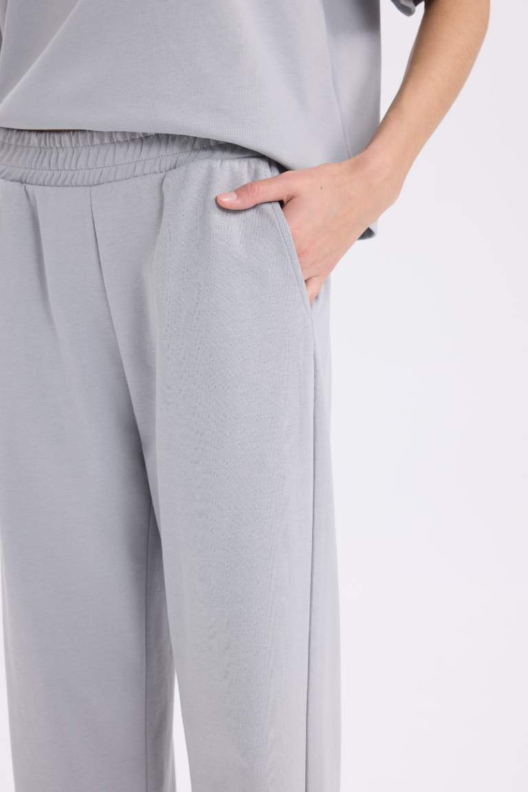 Pantalon de survêtement gris large avec poches