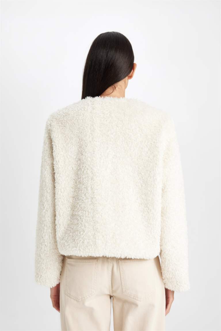 جاكيت فرو صناعي قصة مريحة بأزرار