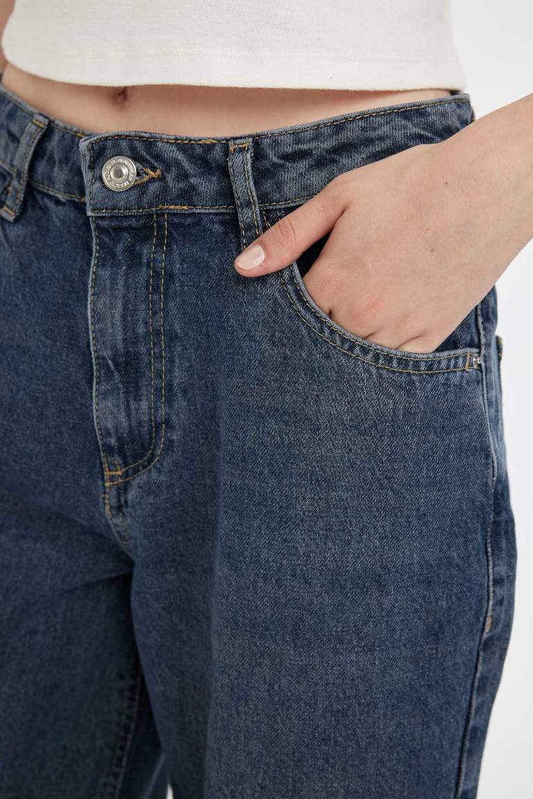 Jean large taille haute, long et délavé