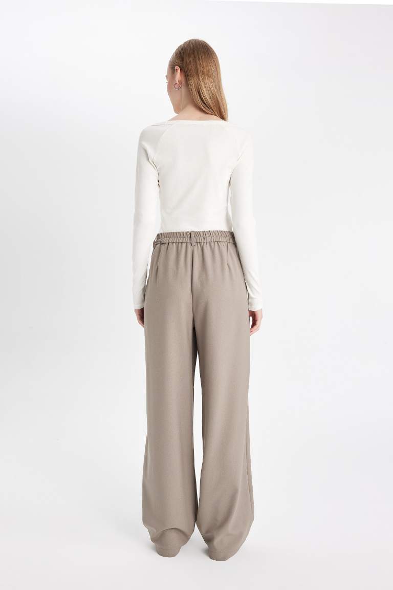 Pantalon Taille haute à jambes larges avec poches