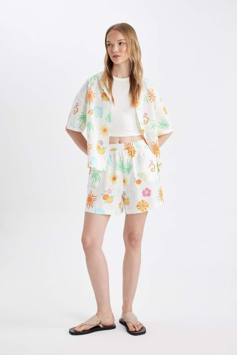 Short en coton évasé à taille régulière et à motifs