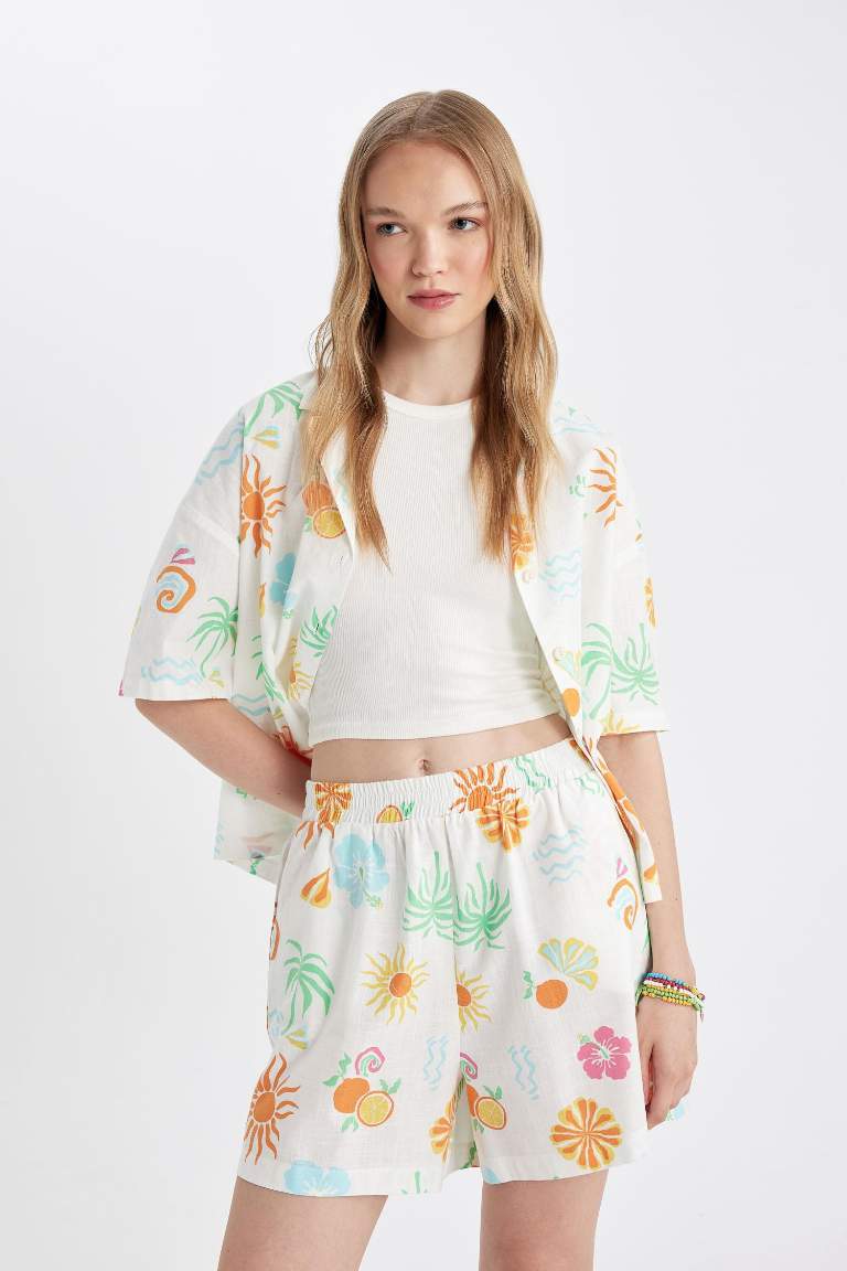 Short en coton évasé à taille régulière et à motifs