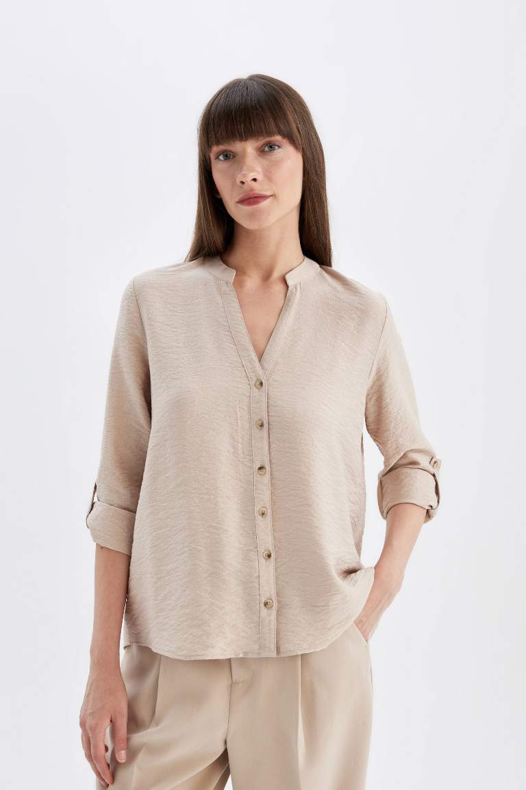 Chemise basique à manches longues avec détail de manche pliée, boutonnée