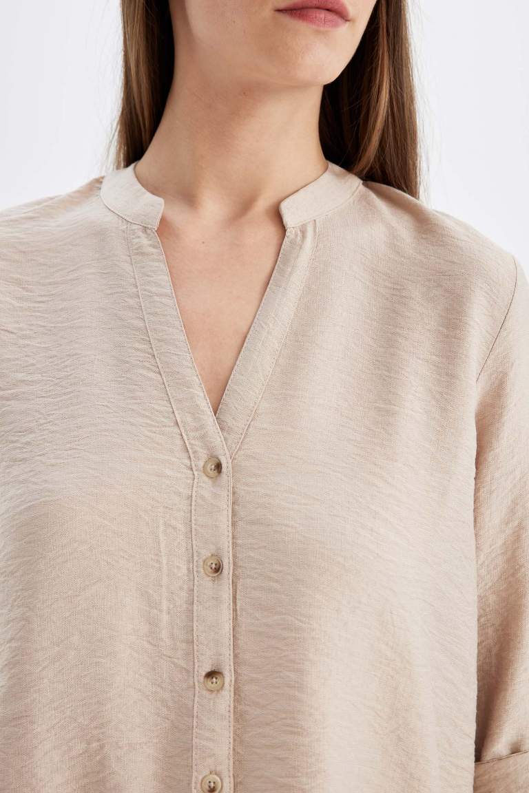 Chemise basique à manches longues avec détail de manche pliée, boutonnée