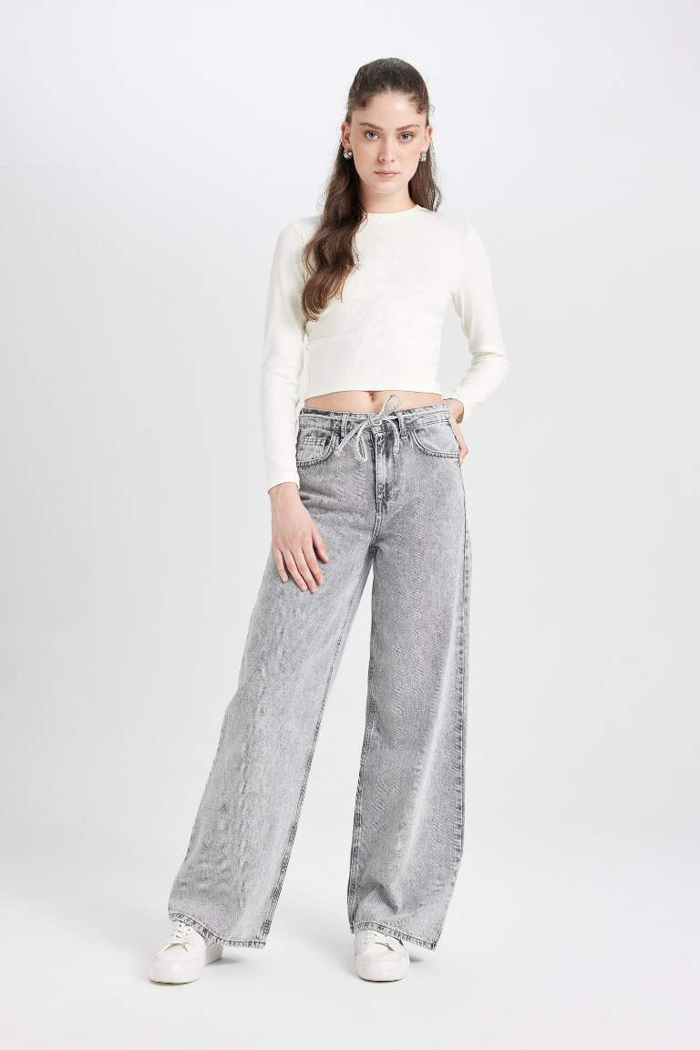 Pantalon Jean taille haute à Jambes larges délavé