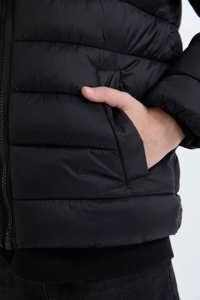 Doudoune à capuche imperméable à fermeture zip