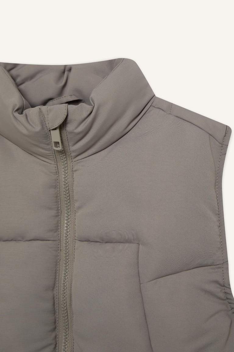 Gilet imperméable à col montant pour garçon