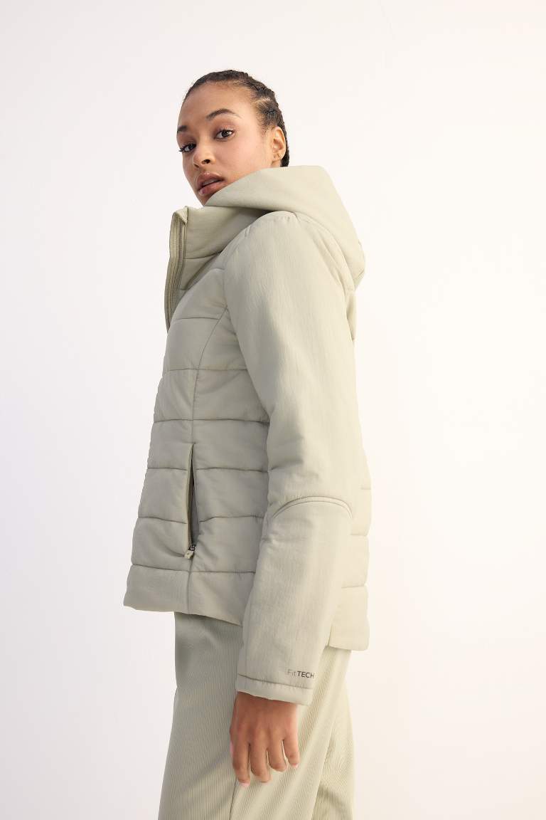 Veste imperméable zippée avec capuche et poches