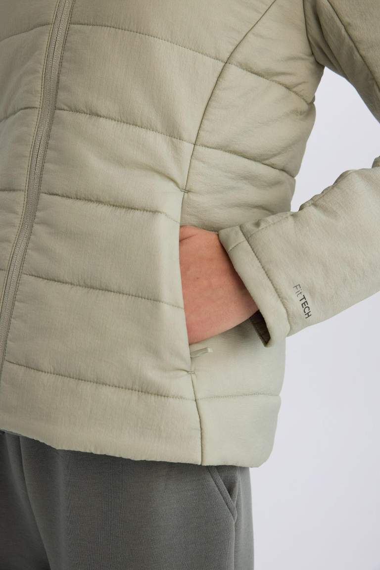 Veste imperméable zippée avec capuche et poches