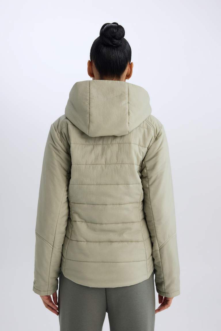 Veste imperméable zippée avec capuche et poches