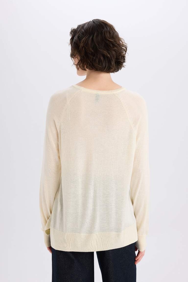 Pull en tricot basique uni à col rond et coupe régulière