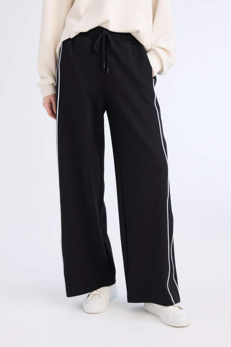 Pantalon droit avec poches et coupe droite