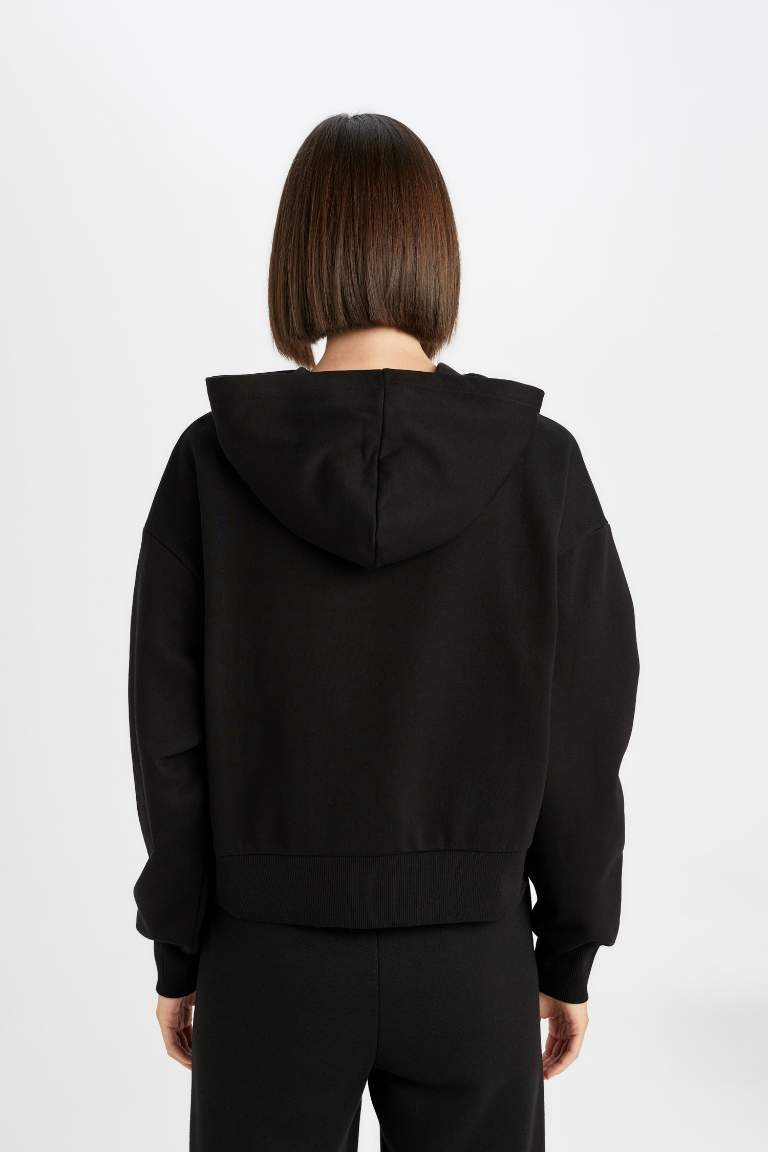Sweat à capuche casual épais noir et imprimé à Coupe Boxy