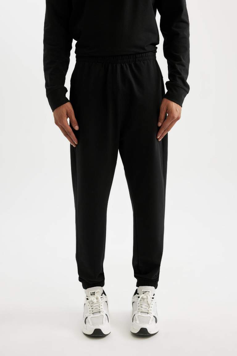 DeFactoFit Sporcu Jogger Eşofman Altı Standart Fit Beli Paçası Lastikli Cepli