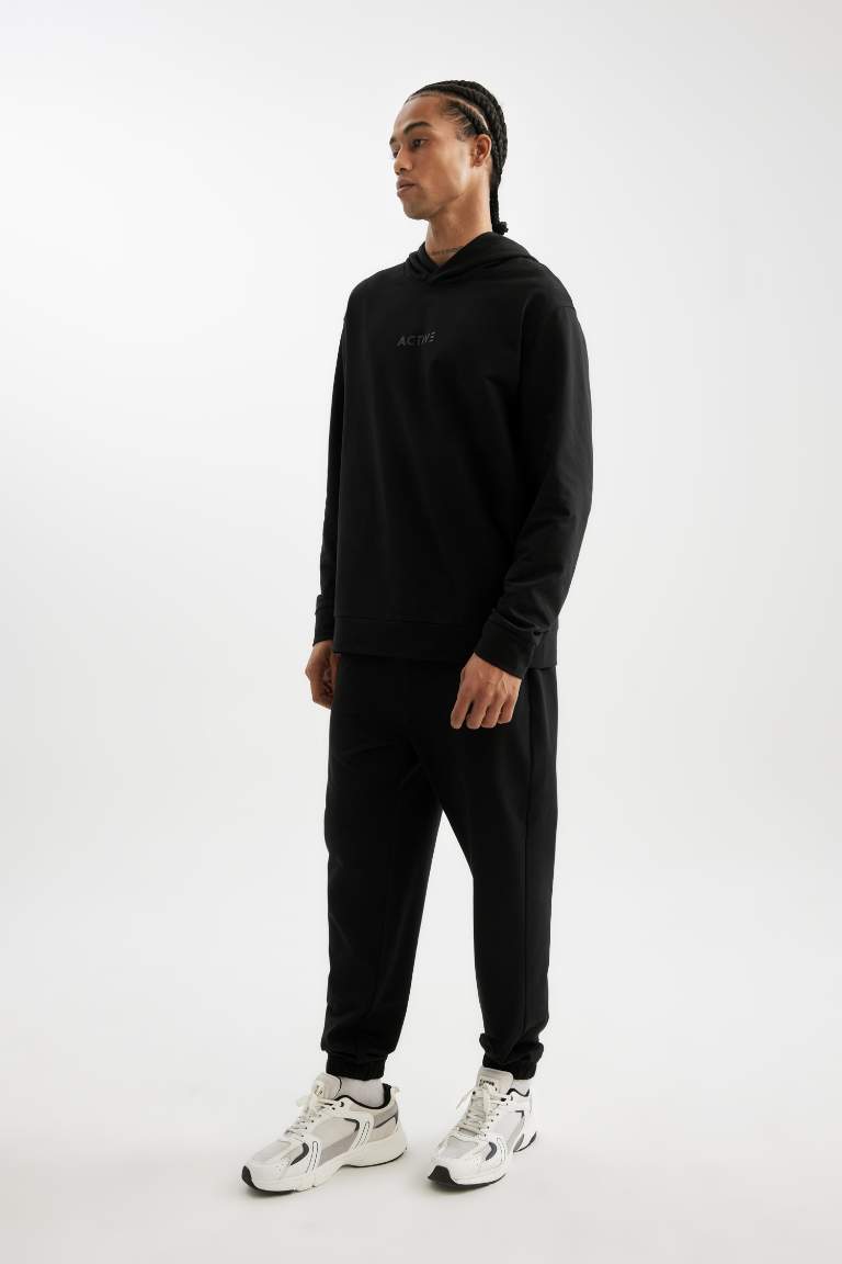 DeFactoFit Sporcu Jogger Eşofman Altı Standart Fit Beli Paçası Lastikli Cepli