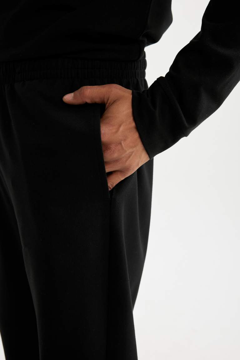 DeFactoFit Sporcu Jogger Eşofman Altı Standart Fit Beli Paçası Lastikli Cepli