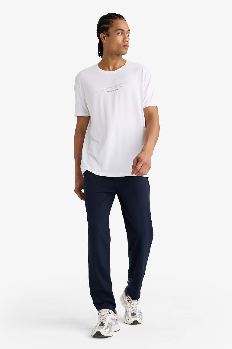 DeFactoFit Slim Fit Dar Kesim Standart Paça Multifonksiyonel Ultrastrech Sporcu Jogger