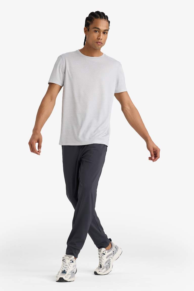 DeFactoFit Slim Fit Dar Kesim Standart Paça Multifonksiyonel Ultrastrech Sporcu Jogger Eşofman Altı