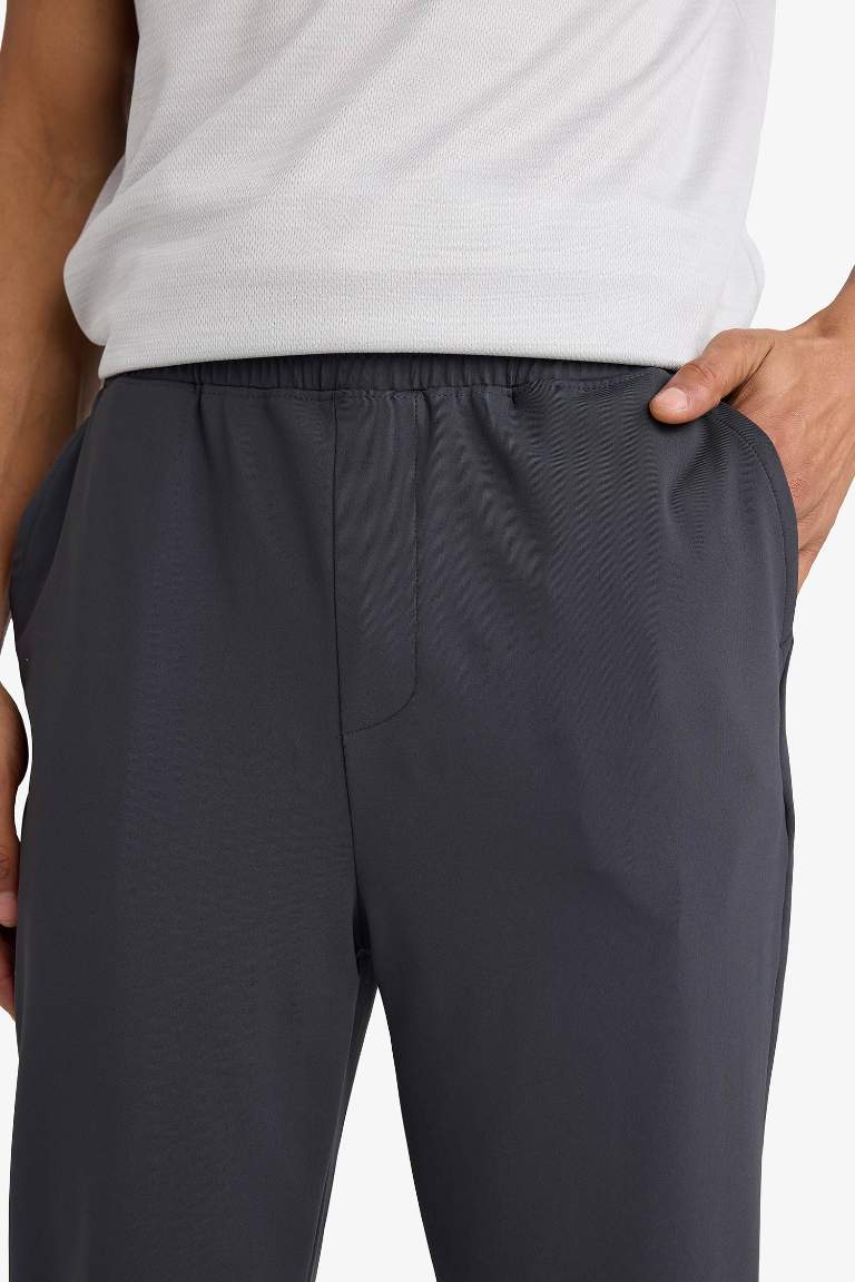 DeFactoFit Slim Fit Dar Kesim Standart Paça Multifonksiyonel Ultrastrech Sporcu Jogger Eşofman Altı