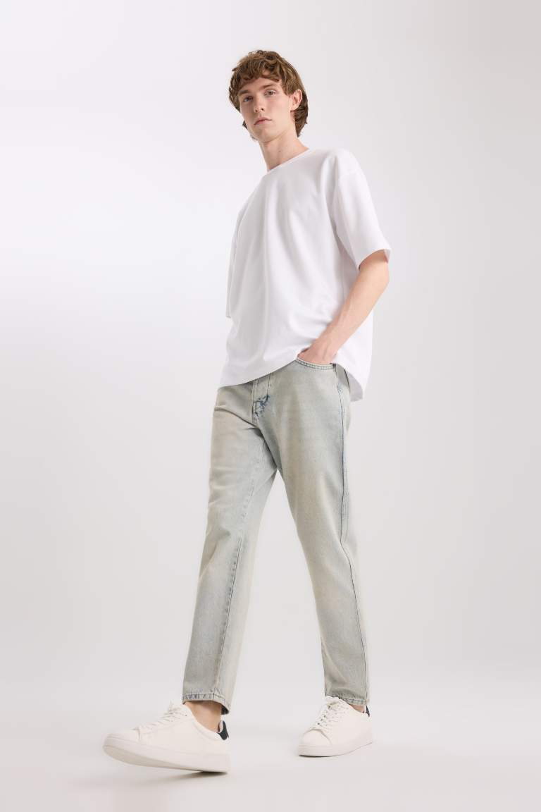 Pantalon Jean coupe slim taille haute et jambes ajustées Style des années 90