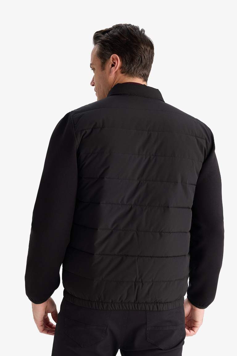 Slim Fit Dar Kesim Dik Yaka Lastikli ve Fermuarlı Su Geçirmez Mont