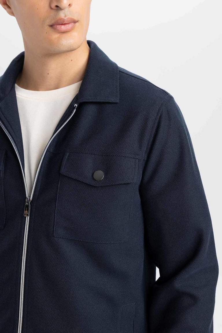 Veste slim à col polo et fermeture zip