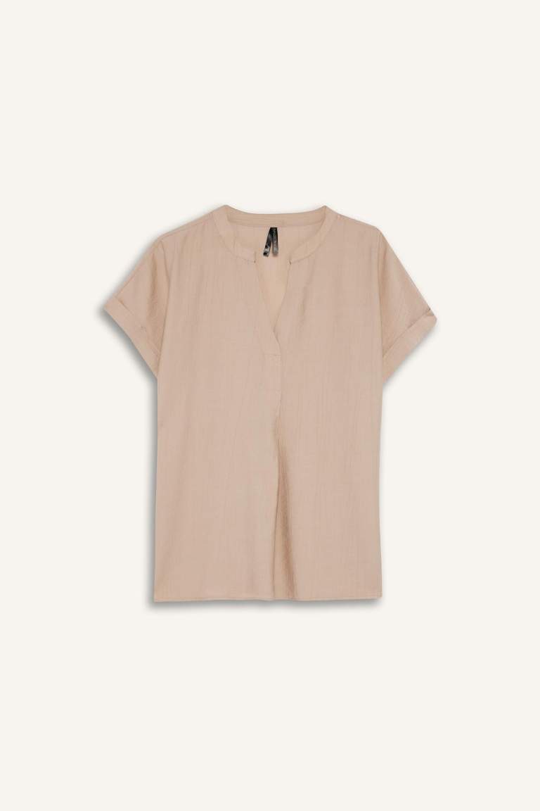 Blouse en tissu gaufré à col rond et manches courtes Coupe régulière