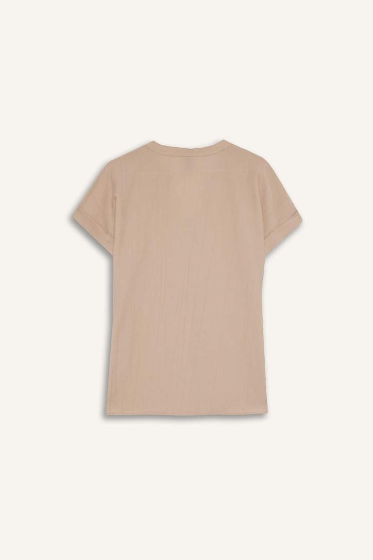 Blouse en tissu gaufré à col rond et manches courtes Coupe régulière