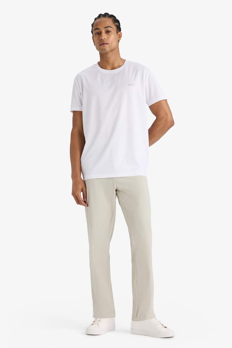 DeFactoFit Slim Fit Dar Kesim Standart Paça Dokuma Sporcu Pantolon