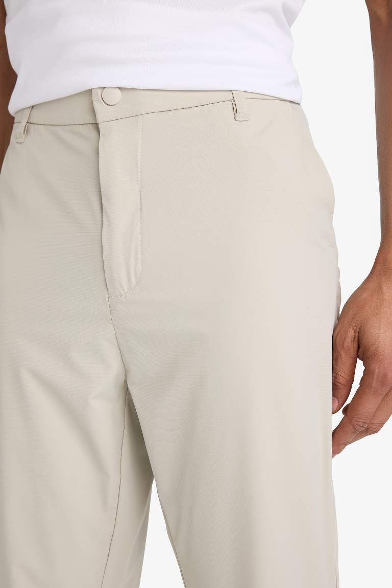 DeFactoFit Slim Fit Dar Kesim Standart Paça Dokuma Sporcu Pantolon