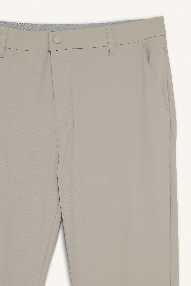 DeFactoFit Slim Fit Dar Kesim Standart Paça Dokuma Sporcu Pantolon
