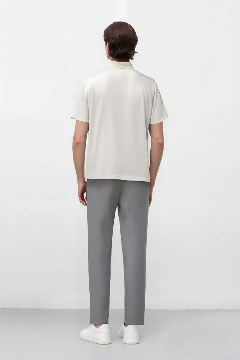 DeFactoFit Slim Fit Dar Kesim Standart Paça Esnek Multifonksiyonel Dokuma Sporcu Pantolon