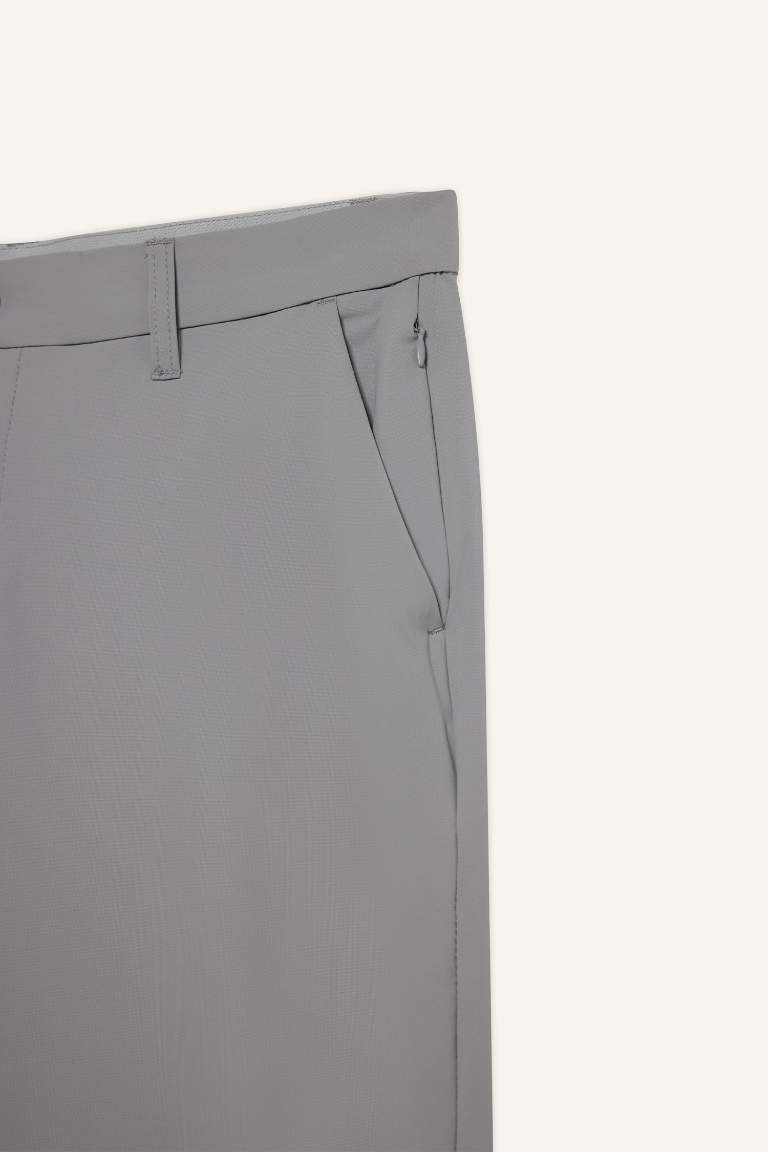 DeFactoFit Slim Fit Dar Kesim Standart Paça Esnek Multifonksiyonel Dokuma Sporcu Pantolon