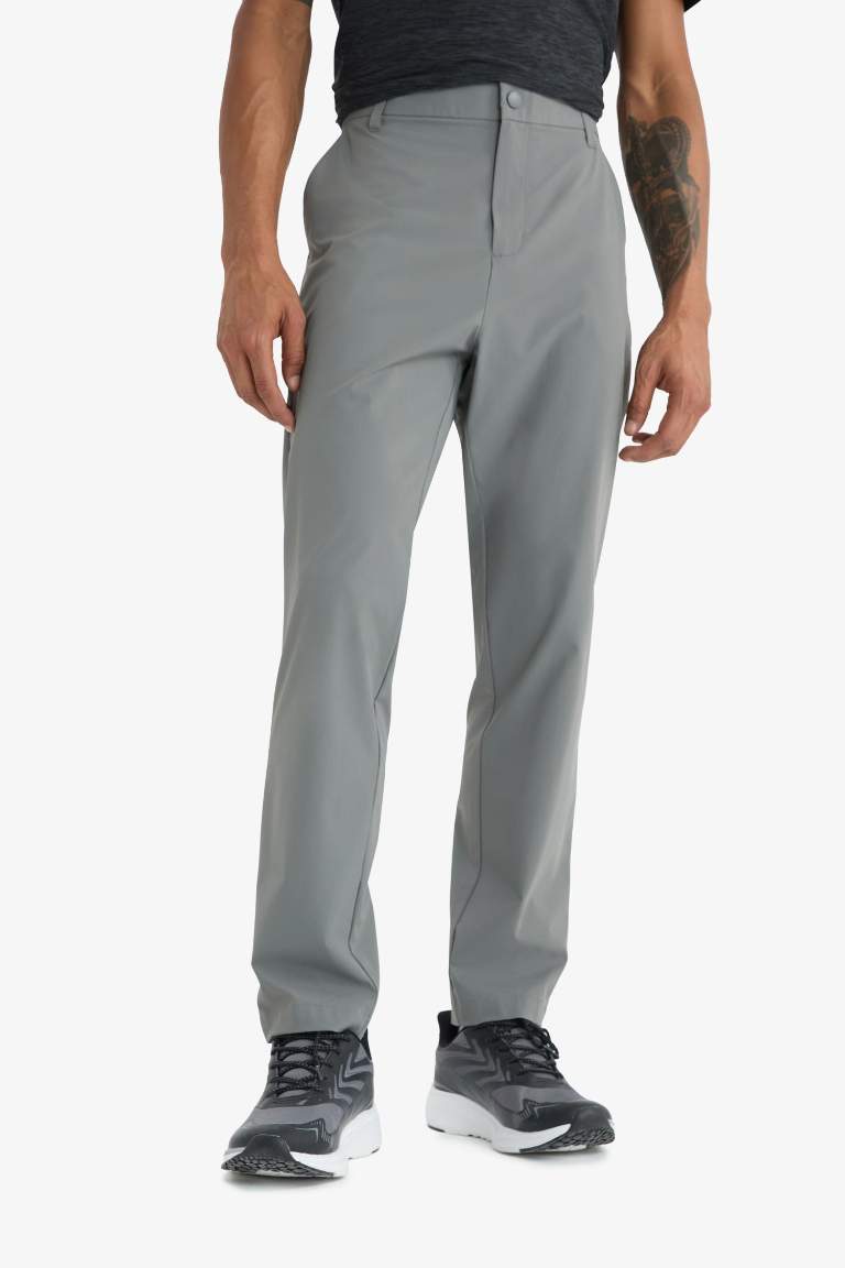 DeFactoFit Slim Fit Dar Kesim Standart Paça Esnek Multifonksiyonel Dokuma Sporcu Pantolon