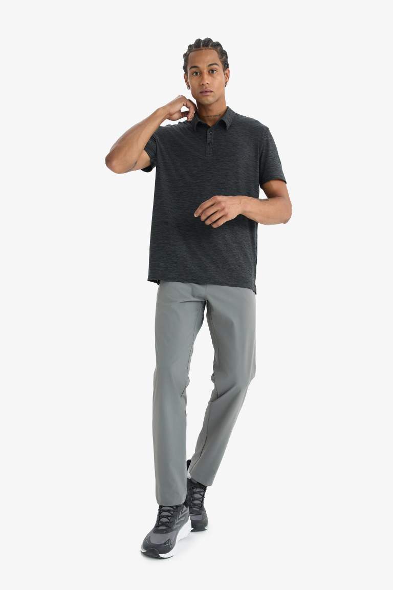 DeFactoFit Slim Fit Dar Kesim Standart Paça Esnek Multifonksiyonel Dokuma Sporcu Pantolon