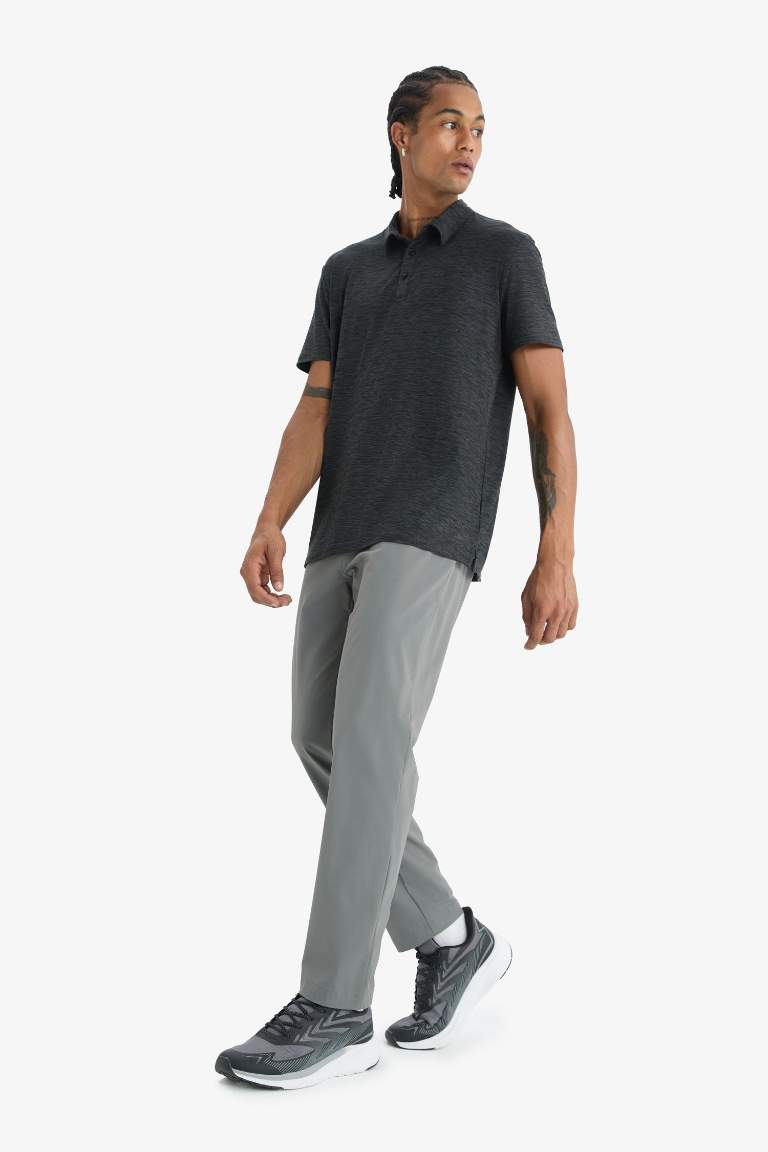 DeFactoFit Slim Fit Dar Kesim Standart Paça Esnek Multifonksiyonel Dokuma Sporcu Pantolon