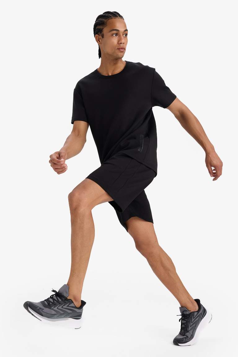 DeFactoFit Standart Fit Modal Kumaş Sporcu Kısa Paça Şort