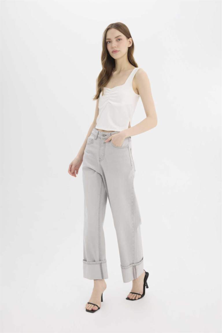 Брюки джинсовые с высокой талией и отворотами, расслабленного кроя